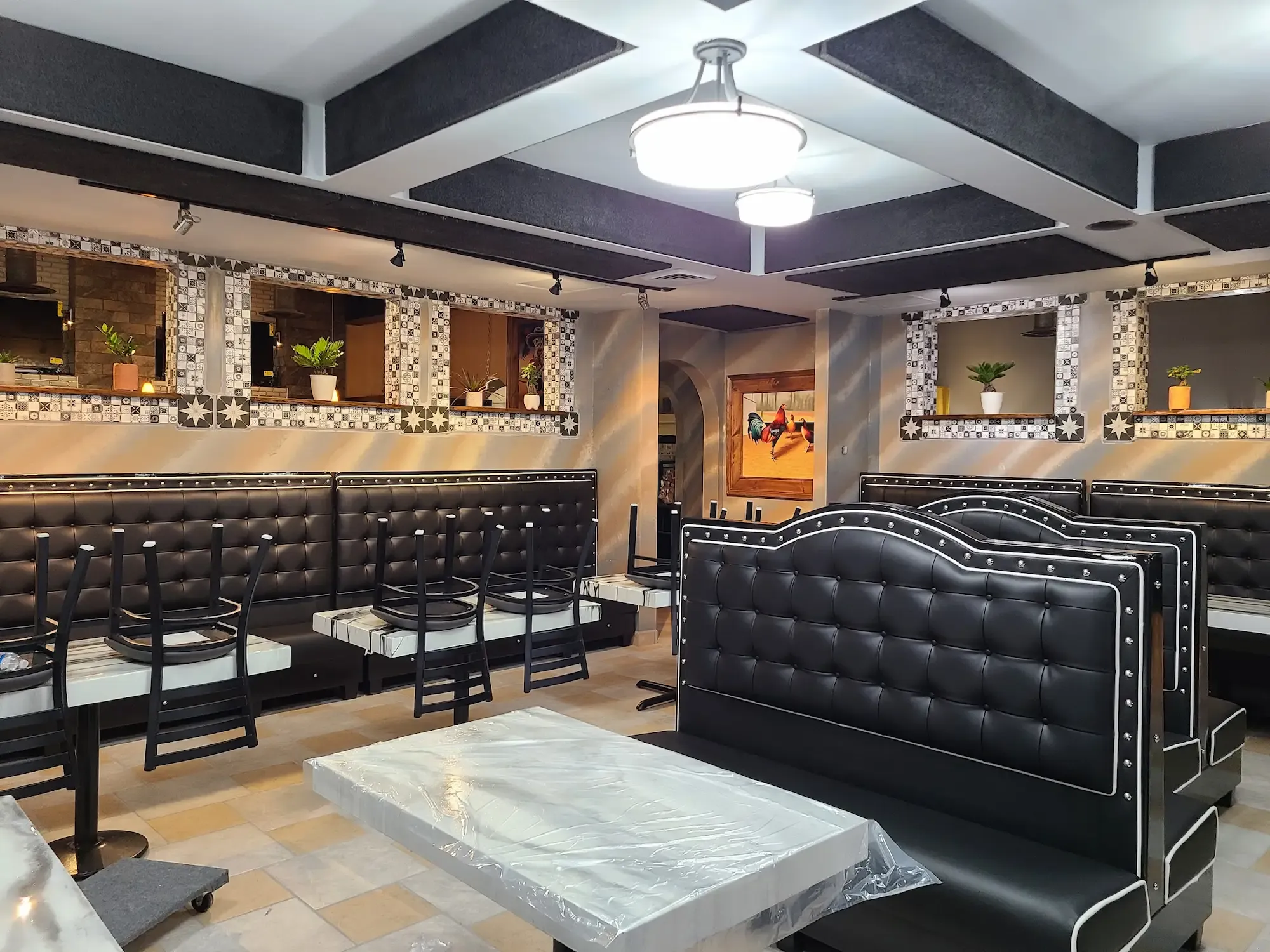 Casa Real Mexican Restaurant interior with dining tables, chairs and bar area